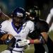 Pioneer High School junior Darius Sanderford runs with the ball against Huron on friday. Pioneer won 35-6. Daniel Brenner I AnnArbor.com